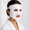 Woman wearing the Orvee LED Face Mask